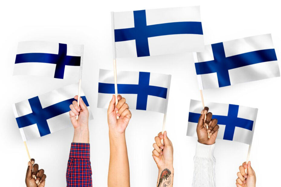 And image of six different hands holding Finland flag