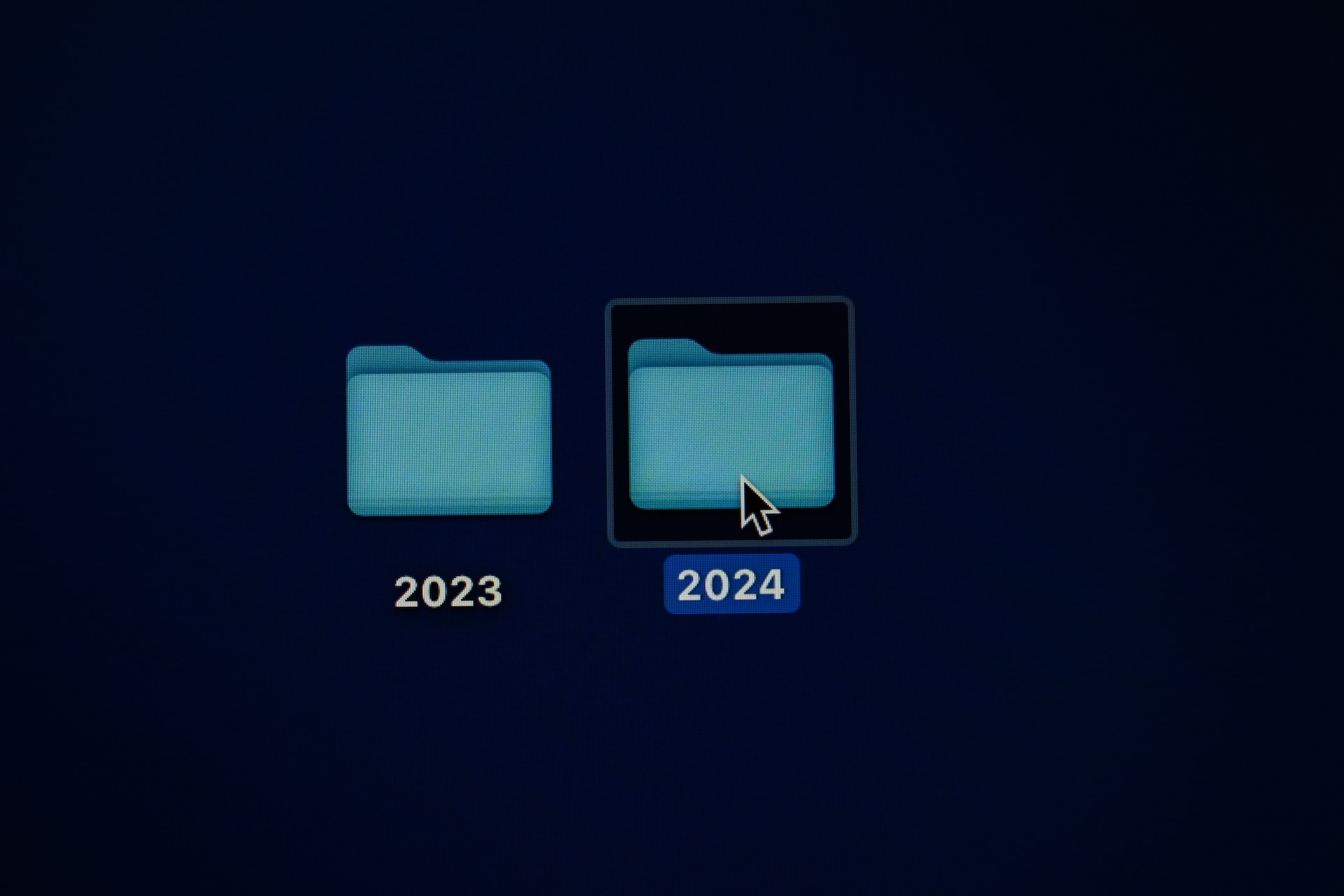 An image of two folder one for 2023, and the other is for 2024