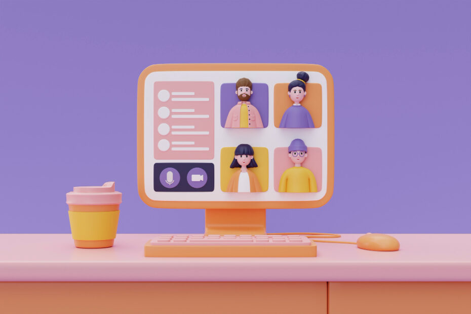 A stylized illustration of a virtual team meeting displayed on a computer monitor. The screen shows four cartoon avatars of team members, each in separate video boxes, with additional interface icons for communication options. The scene is set on a desk with a pastel orange keyboard and mouse, and a stacked yellow and pink coffee cup, all against a lavender background.