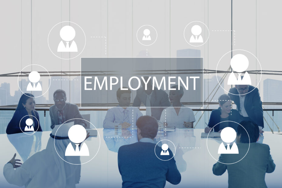 A professional business meeting with diverse employees discussing different types of employment, with a digital overlay of connected workforce icons and the word "EMPLOYMENT" displayed prominently.