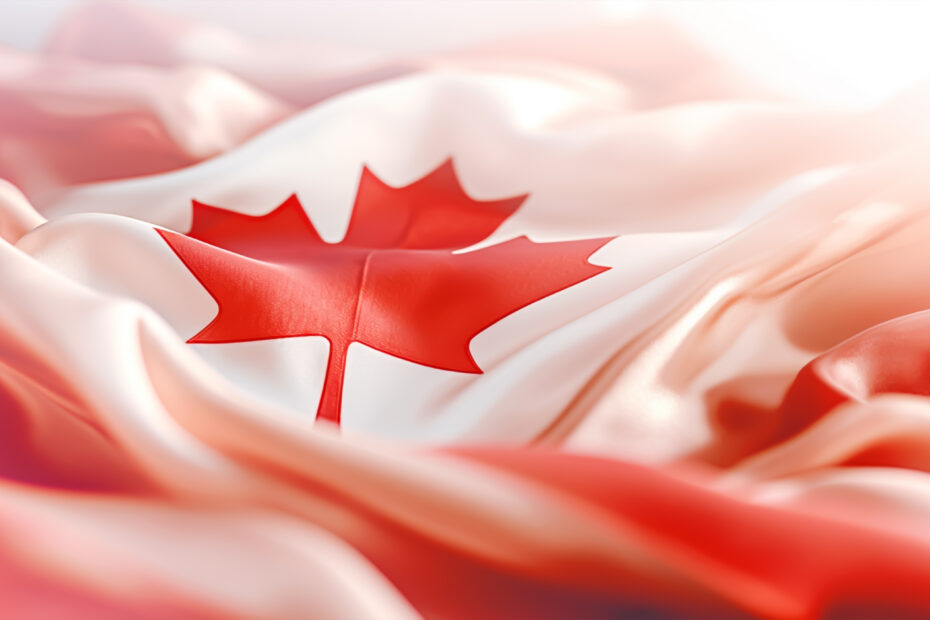 "Close-up of the Canadian flag with soft lighting and flowing fabric texture, symbolizing national pride and celebration for Canada Day 2025.